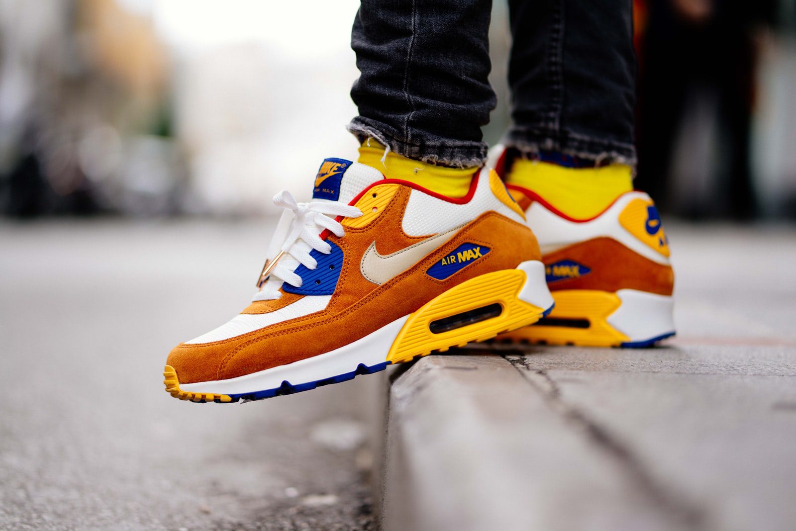 student finish line brown-and-white Nike Air Max